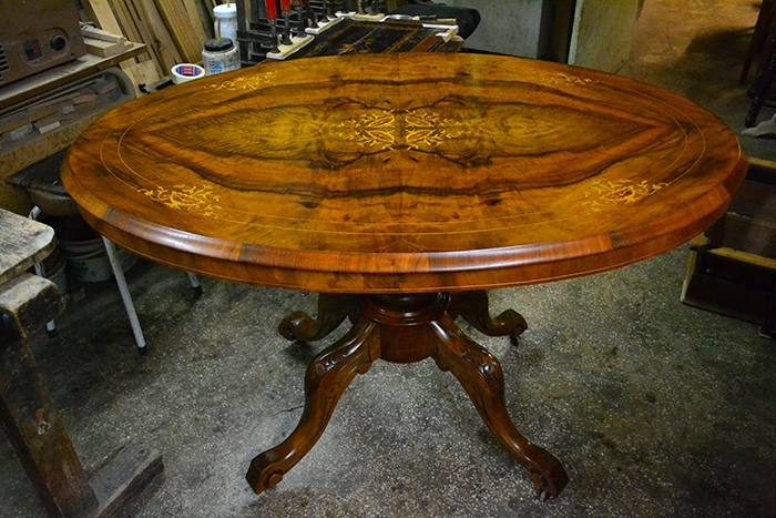An-English-Victorian-walnut-center-table-with-satinwood-marquetry-decoration-36