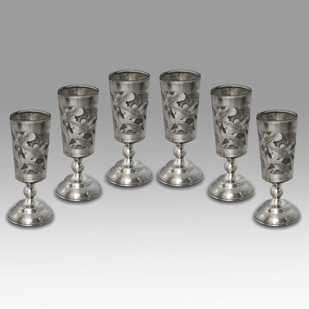 A set of six sterling silver liquor cups