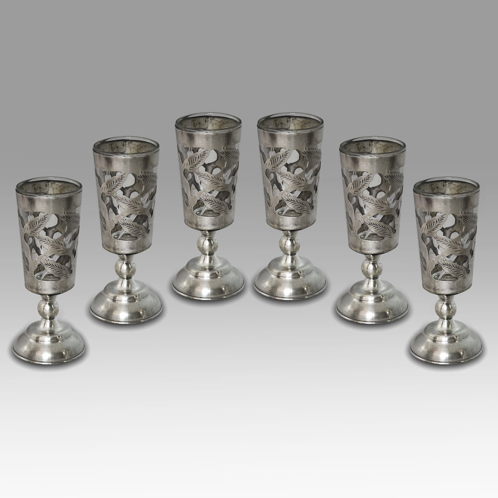 A set of six sterling silver liquor cups